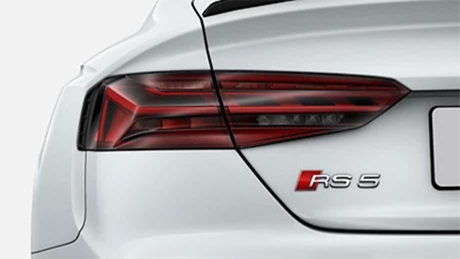 Rear tail light and badge of a Naldo Grey Audi RS5