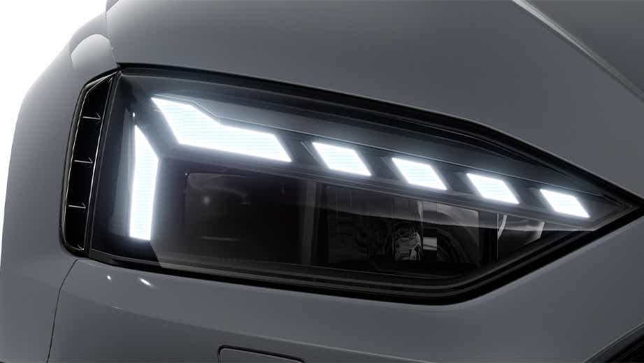 Headlight close-up of a Naldo Grey Audi RS5