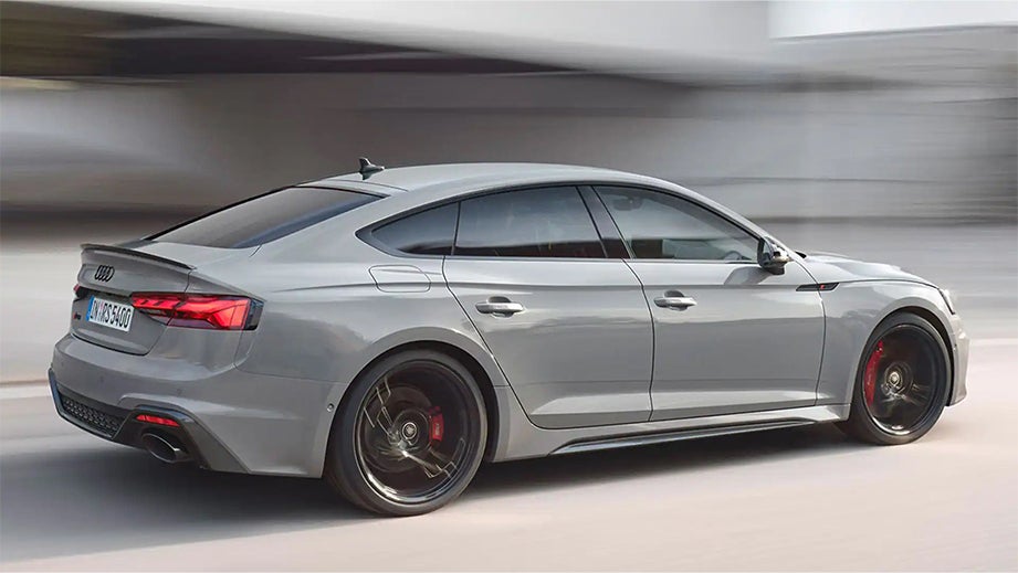 rear three-quarter view of a Naldo Grey Audi RS5
