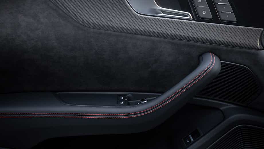 Interior driver-side door panel of a Naldo Grey Audi RS5