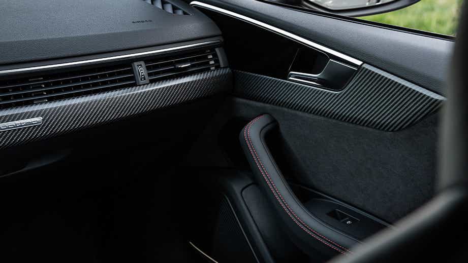 Interior dashboard and passenger door of an Audi RS5