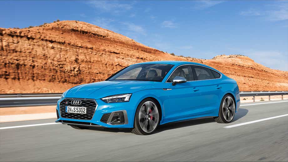 front three-quarter view of a Tango Red Metallic Audi S5 Sportback