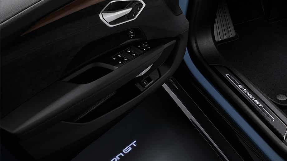 driver door panel and illuminated sill of an Audi e-tron GT