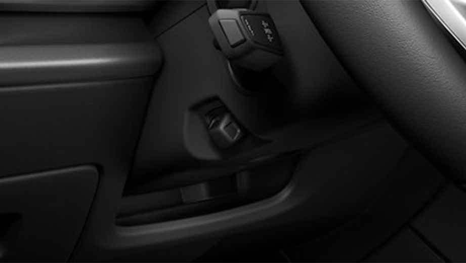close-up of interior door controls of an Audi Q7 2022-2023
