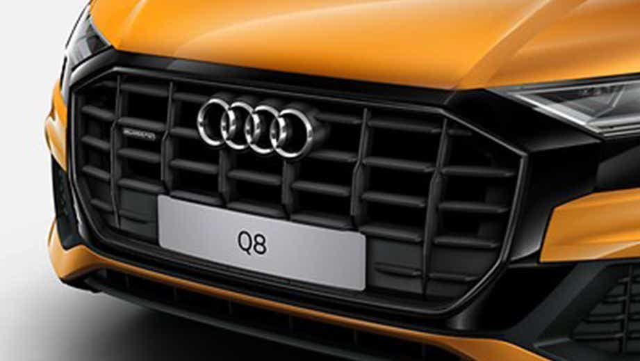 front grille of a Dragon Orange Metallic Audi Q8 2020-2023