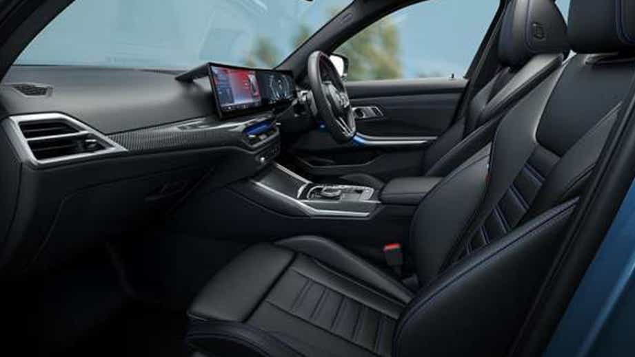 interior front seats and dashboard of a BMW 3 Series