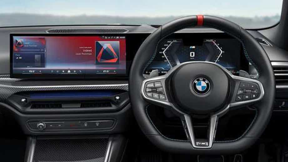 Interior dashboard and steering wheel of a BMW 3 Series