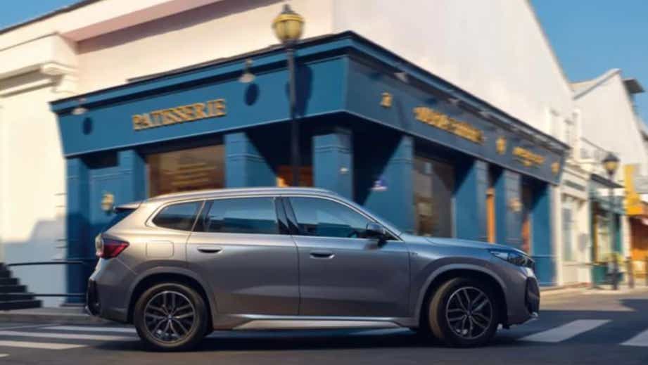 side view of a Skyscrapper Grey Metallic BMW iX1