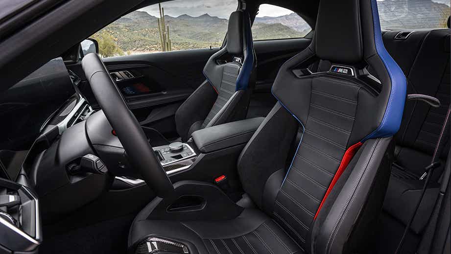 Front interior seats and dashboard of a BMW M2