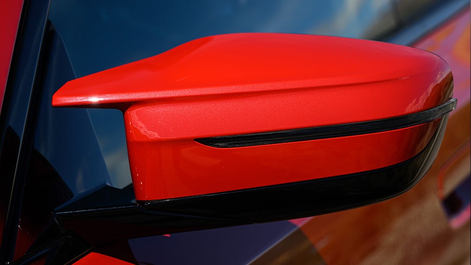 Side mirror close-up of a BMW M2