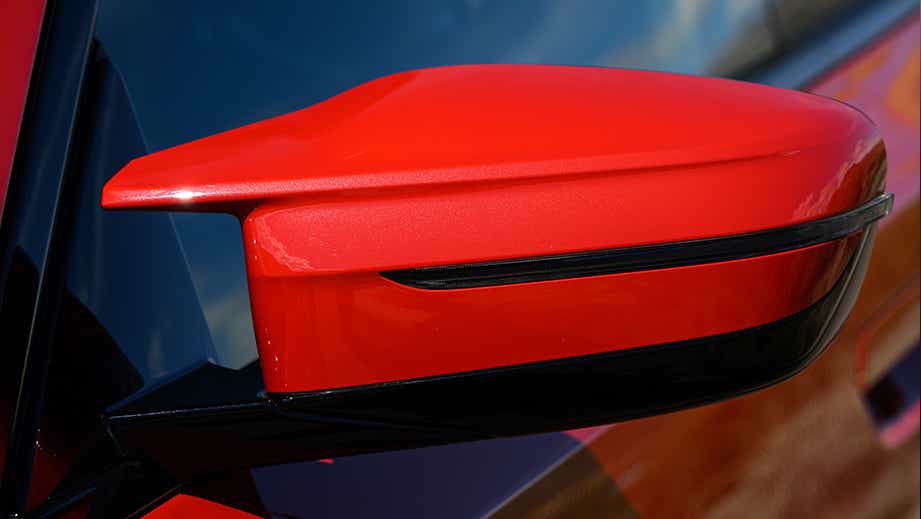 Side mirror close-up of a BMW M2