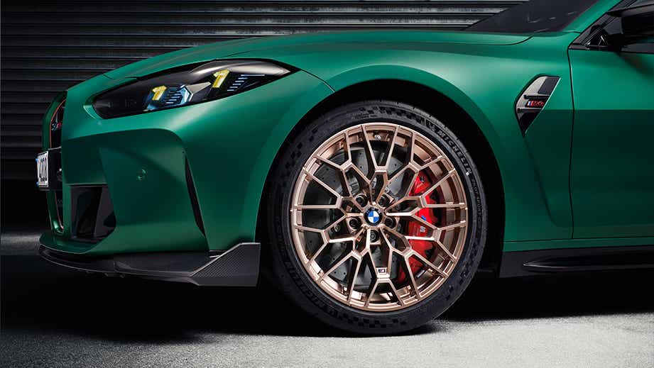 Front wheel and fender of a BMW M4 Competition