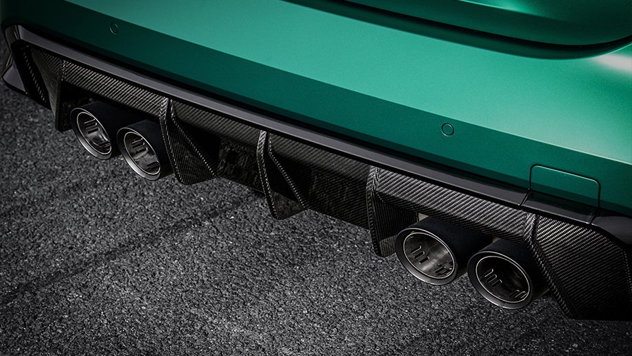 rear diffuser and exhaust view of a BMW M4 Competition