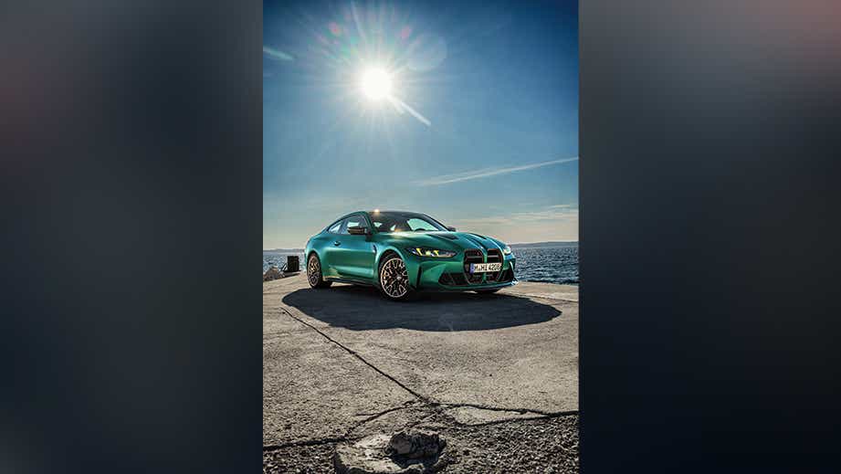 front three-quarter view of a BMW M4 Competition