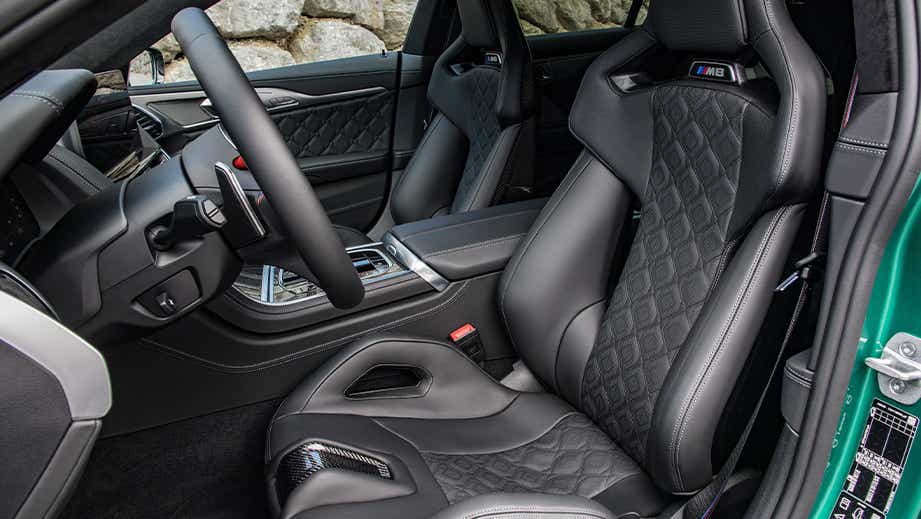 Front seats and interior view of a Black Sapphire BMW M8 Coupe Competition