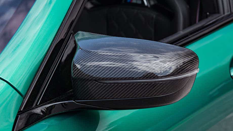 Side mirror close-up of a BMW M8 Coupe Competition
