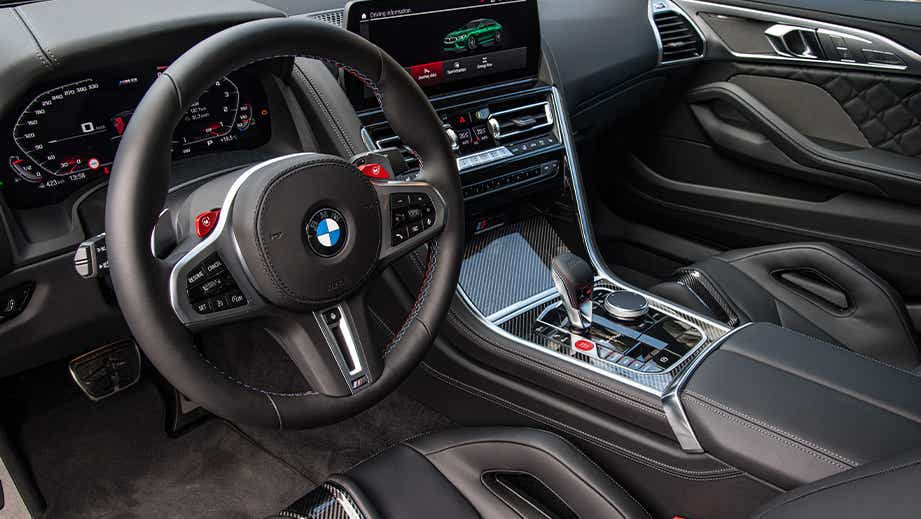 Interior dashboard of a Black Sapphire BMW M8 Coupe Competition