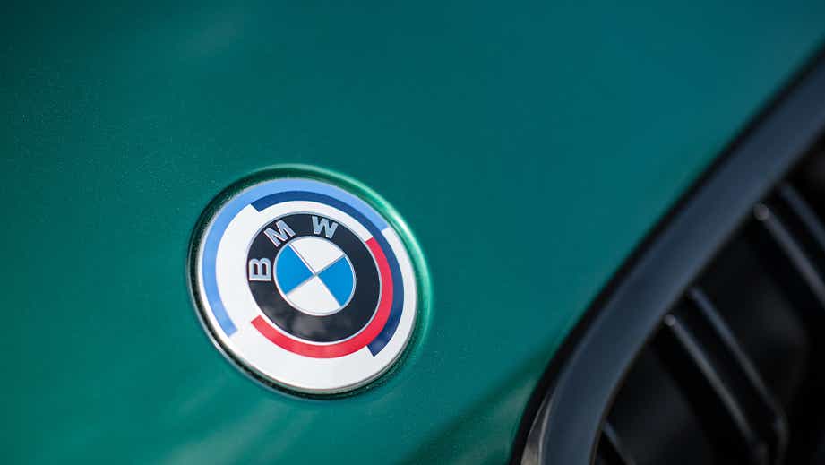 Close-up of BMW M8 Coupe Competition badge on bonnet