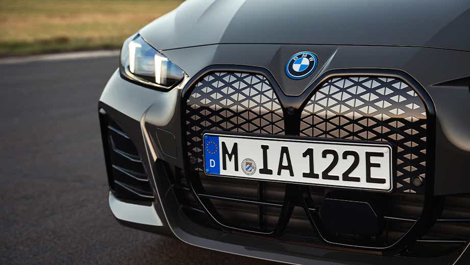 Front grille and headlight close-up of a Black Sapphire BMW i4