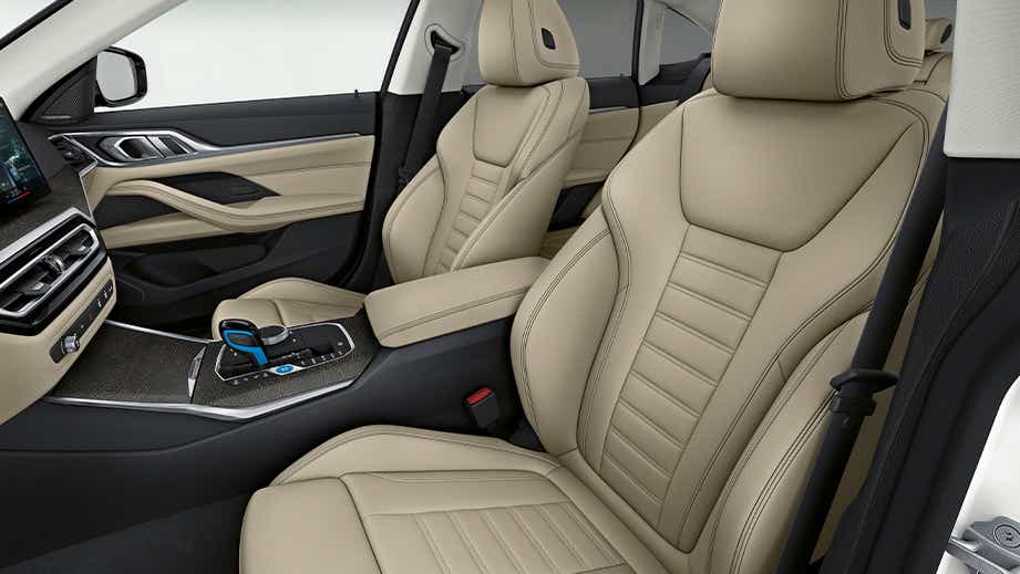 front interior seats and dashboard of a BMW i4