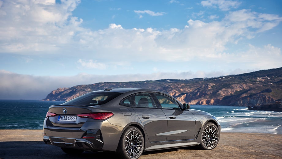 rear three-quarter view of a Black Sapphire BMW i4