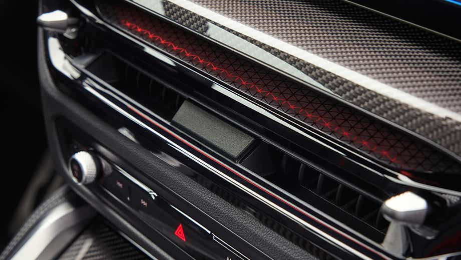 Interior dashboard detail of a Black Sapphire BMW i4