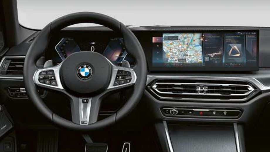 interior dashboard and steering wheel of a BMW 3 Series