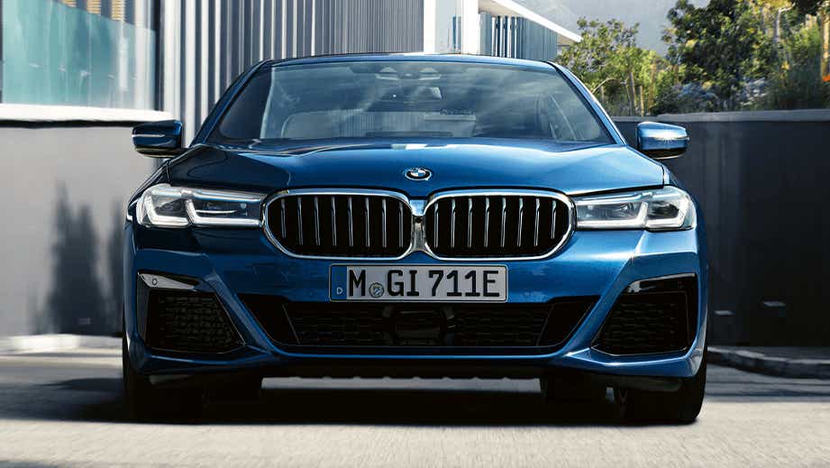 front view of a Phytonic Blue BMW 5 Series 2021-2023