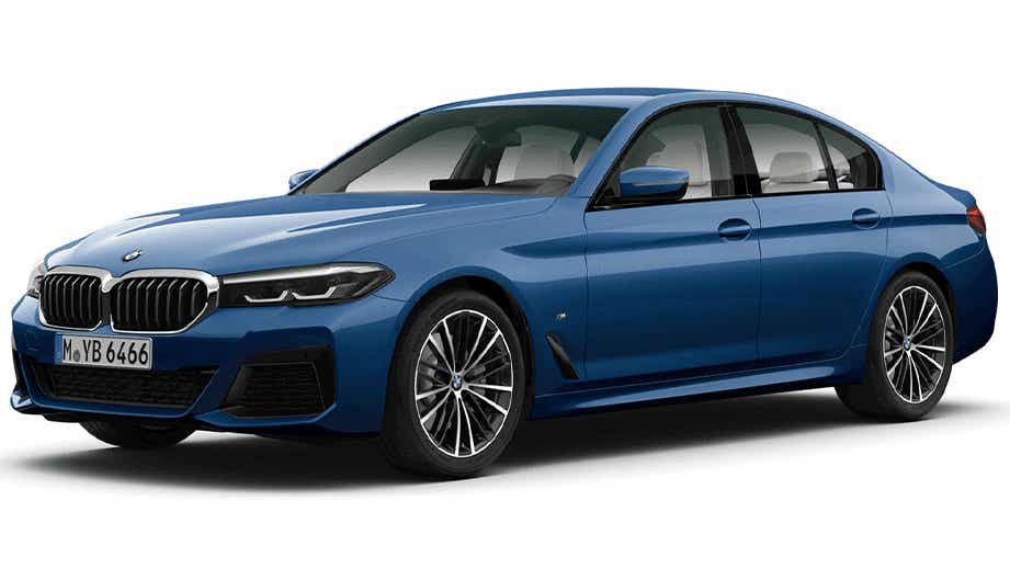 Front three-quarter view of a Phytonic Blue BMW 5 Series 2021-2023