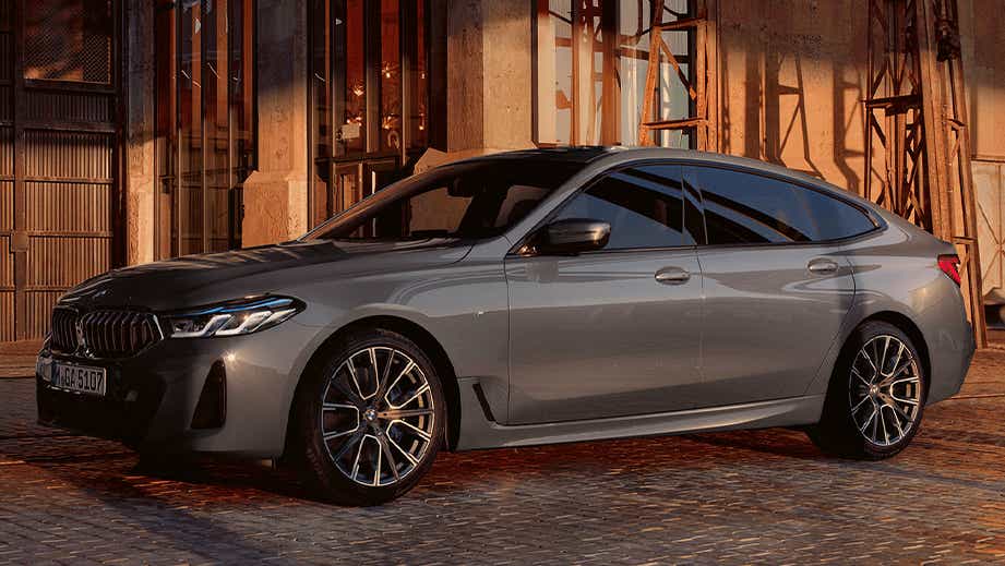 side view of a Mineral White BMW 6 Series