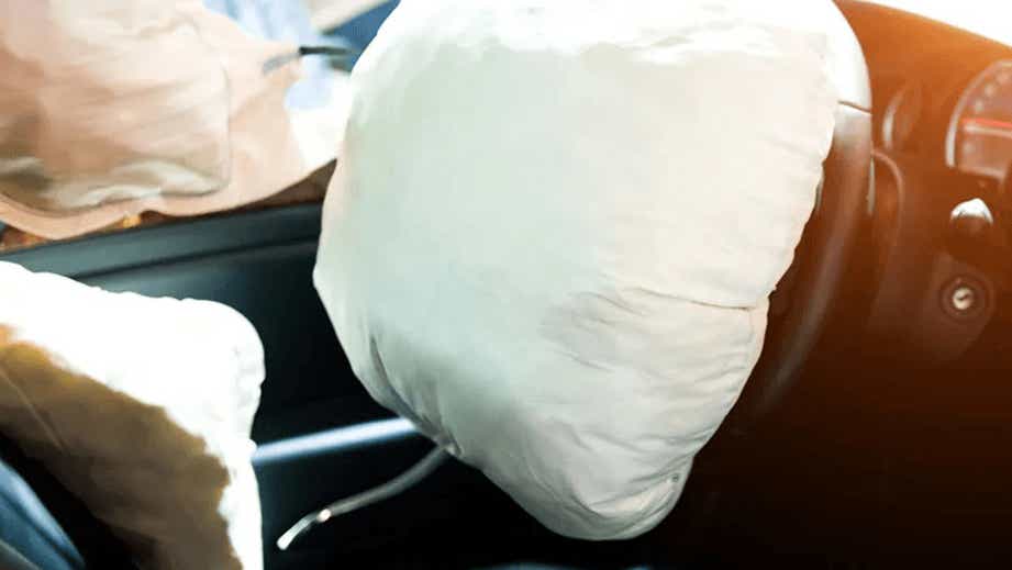 Deployed airbags in a BMW Z4 interior