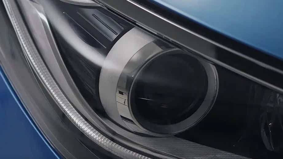 Headlight close-up of a Blue BYD E6