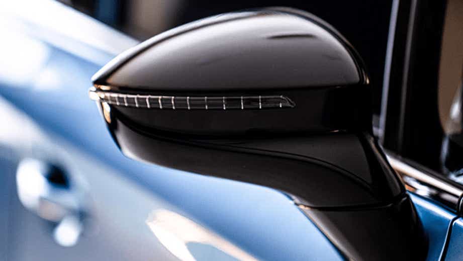 Side mirror close-up of a BYD E6