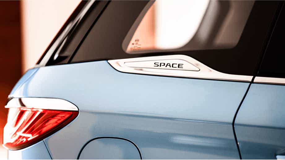 Rear quarter view of a Blue BYD E6