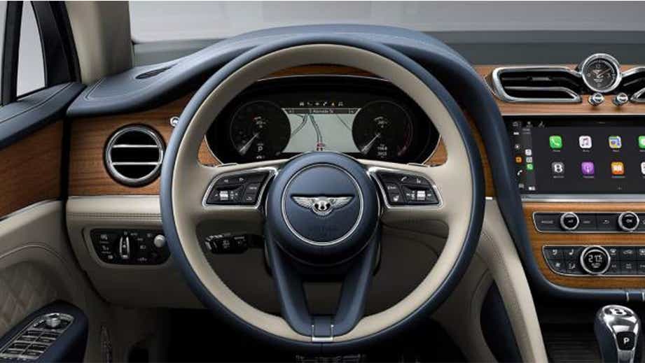 interior dashboard and steering wheel of a Bentley Bentayga