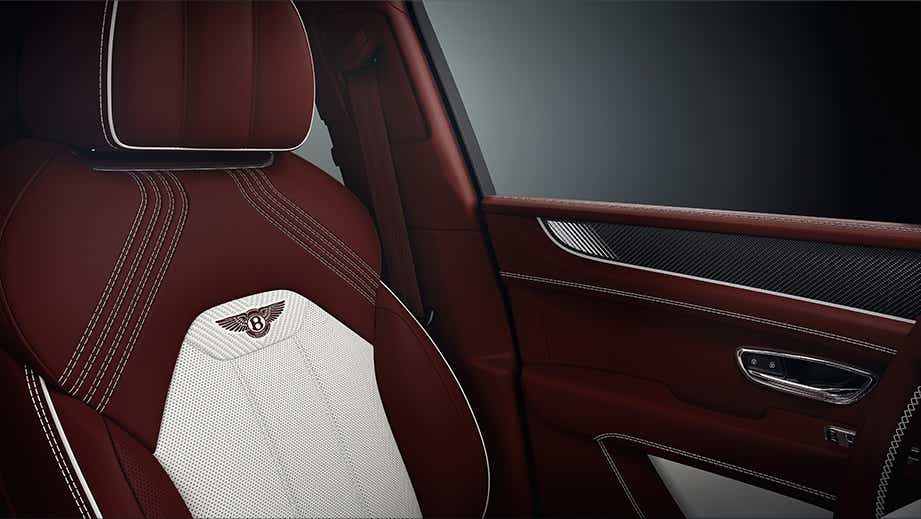 Front seat and interior door detail of a Bentley Bentayga