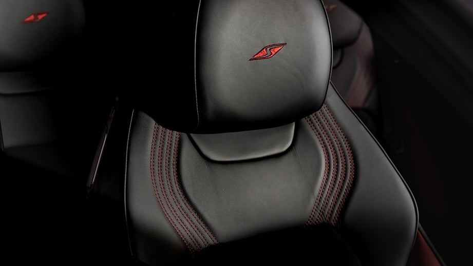 close-up of seat with logo in a Bentley Continental
