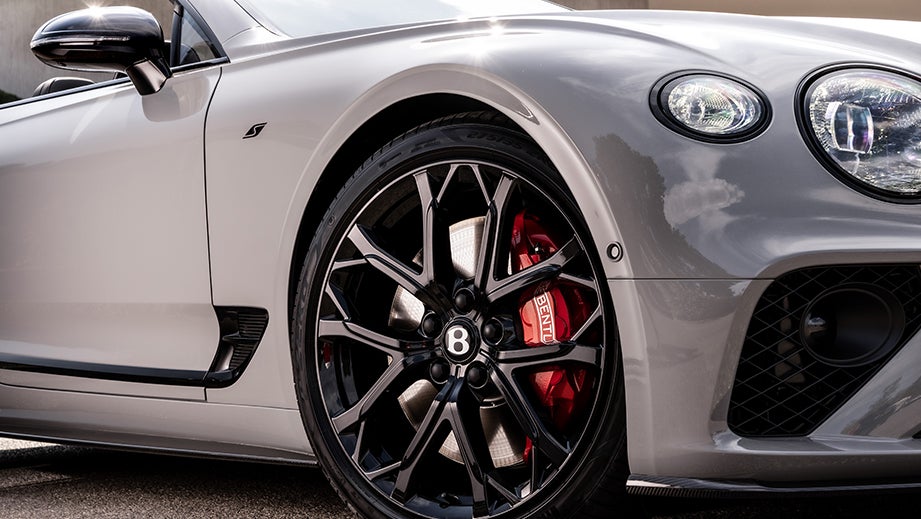 Front wheel and headlight close-up of a Bentley Continental