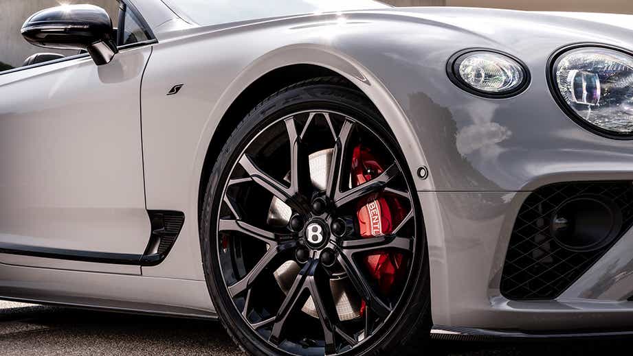 Front wheel and headlight close-up of a Bentley Continental