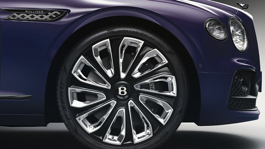 Front wheel and headlight of a Bentley Flying Spur