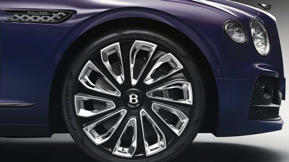 Front wheel and headlight of a Bentley Flying Spur