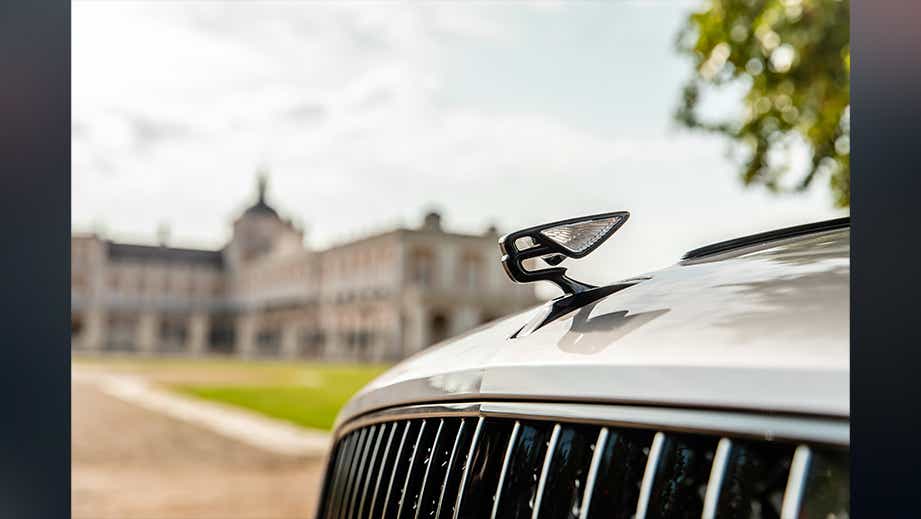 Hood ornament close-up of a Bentley Flying Spur