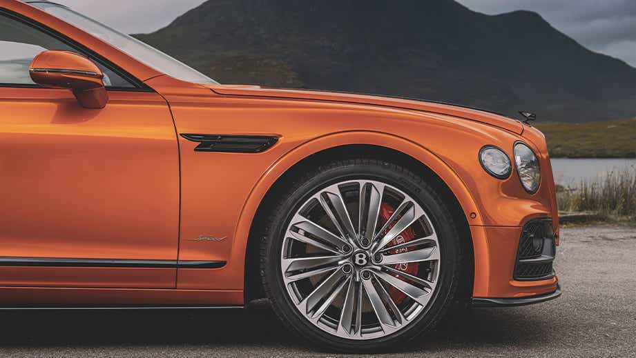 Front side view of a Bentley Flying Spur