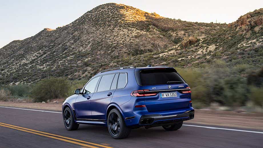 rear three-quarter view of a tanzanite Blue Metallic BMW X7