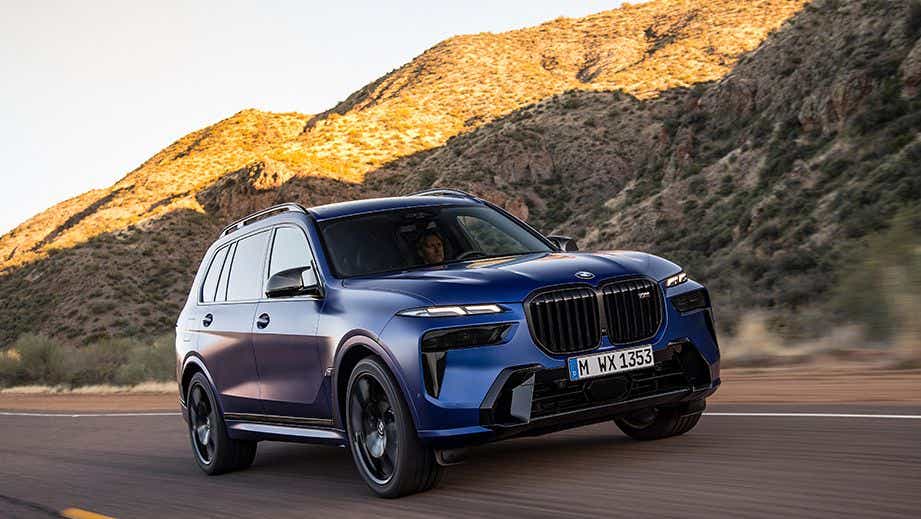 front three-quarter of a tanzanite Blue Metallic BMW X7