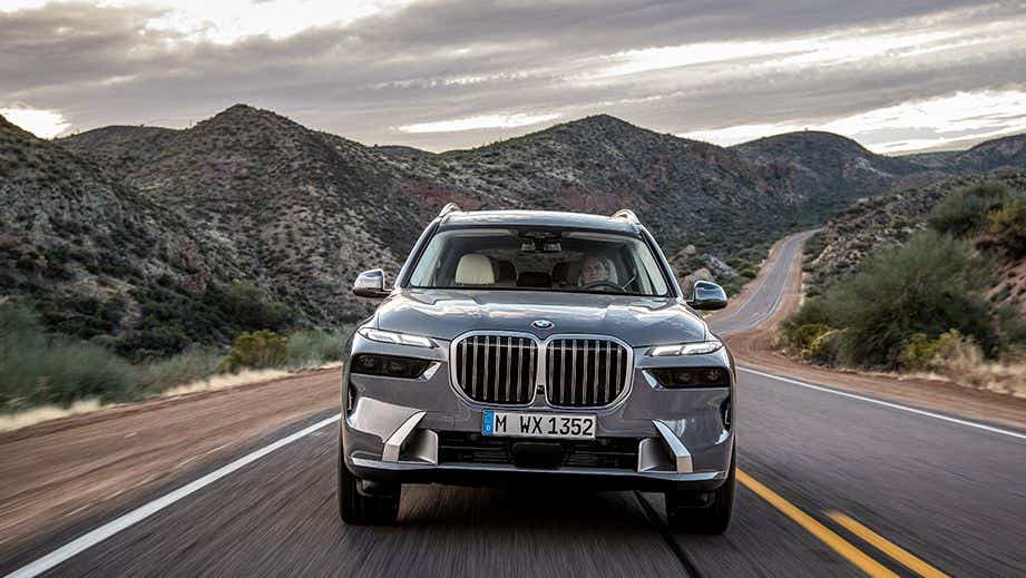 front view of a BMW X7 on a scenic road