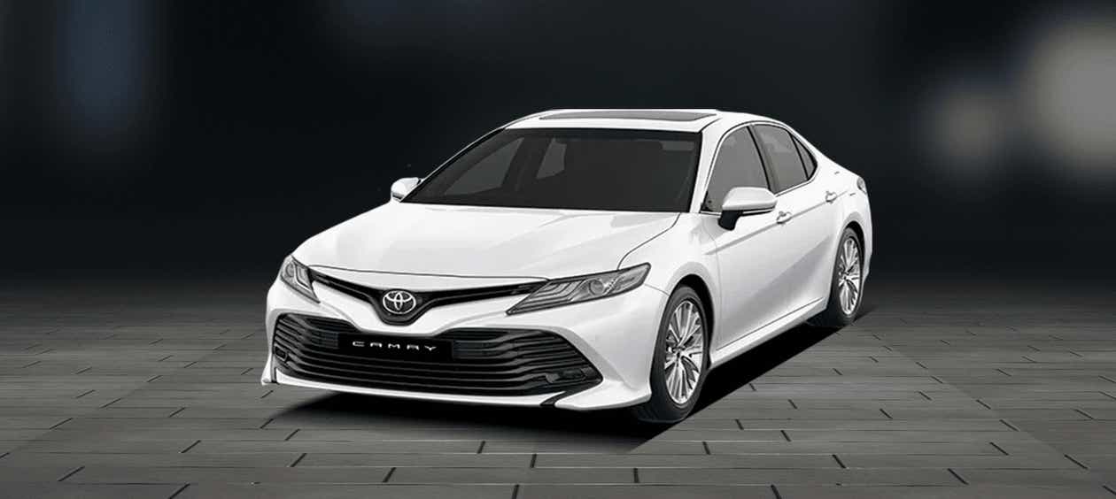 front three-quarter view of a PLATINUM WHITE PEARL Toyota Camry 2022-2023