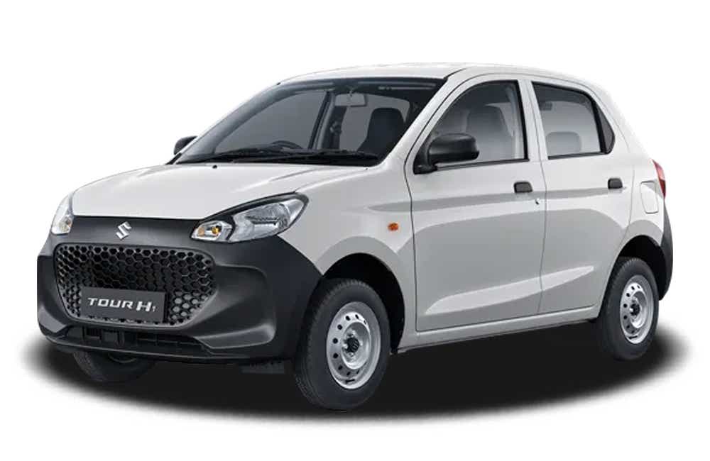 front three-quarter of a Solid White Maruti Suzuki Alto Tour