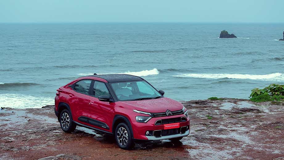 front three-quarter view of a Garnet Red Citroen Basalt