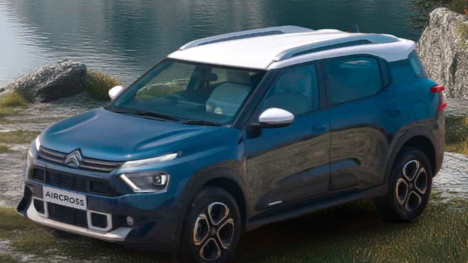 front three-quarter view of a Steel Grey with Cosmo Blue Citroen Aircross